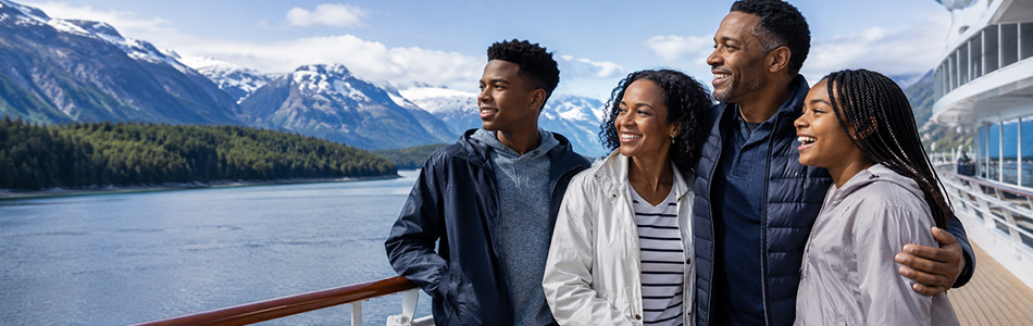African American family enjoying scenic Alaska cruise views from the ship deck