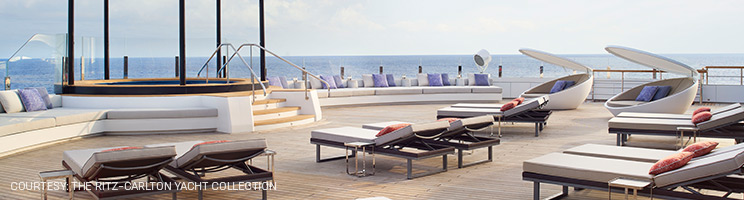 The Spa Terrace aboard Evrima features luxurious loungers, open-air relaxation spaces, and panoramic ocean views, creating a tranquil retreat at sea. The Spa Terrace aboard Evrima features luxurious loungers, open-air relaxation spaces, and panoramic ocean views, creating a tranquil retreat at sea.