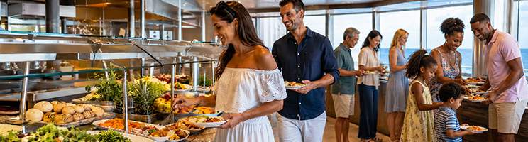 Families and couples enjoying casual buffet dining with fresh food stations aboard a cruise ship. Families and couples enjoying casual buffet dining with fresh food stations aboard a cruise ship.