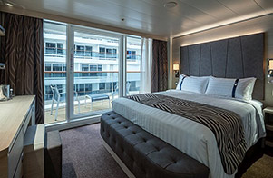 Deluxe Balcony with Promenade View Stateroom